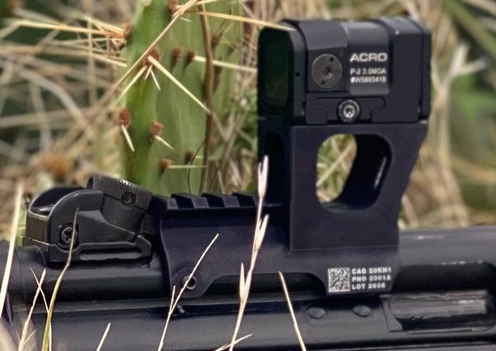 Closeup of the Hansel MP5 optics mount with Aimpoint ACRO P-2 red dot installed on an MP5 receiver